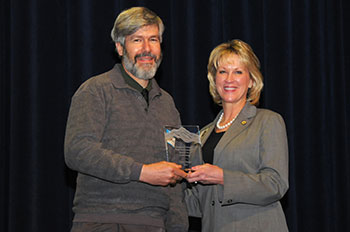 Photo of Leon Shaul receiving award