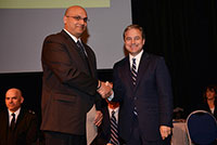 Photo of Amal Agalawatta receiving Honorable Mention