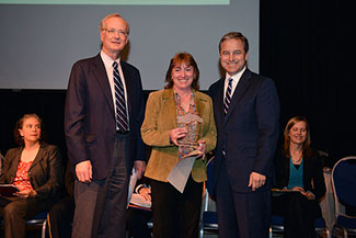 Photo of Claire Fishwick receiving Customer Service Excellence award