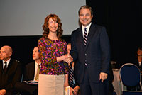 Photo of Laurie Holland receiving Honorable Mention