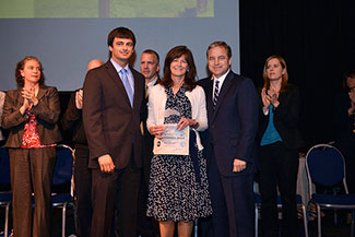 Photo of accepting the award on behalf of Robert Hammel