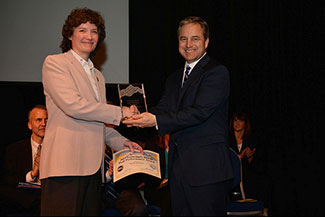 Photo of Susan Winton receiving Co-Worker Recognition award